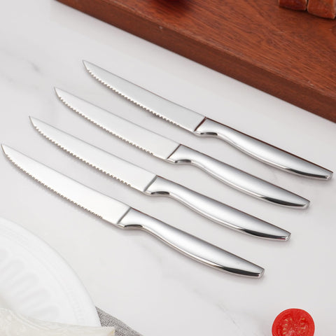 SuperCook steak knives in action showing precise, clean cuts