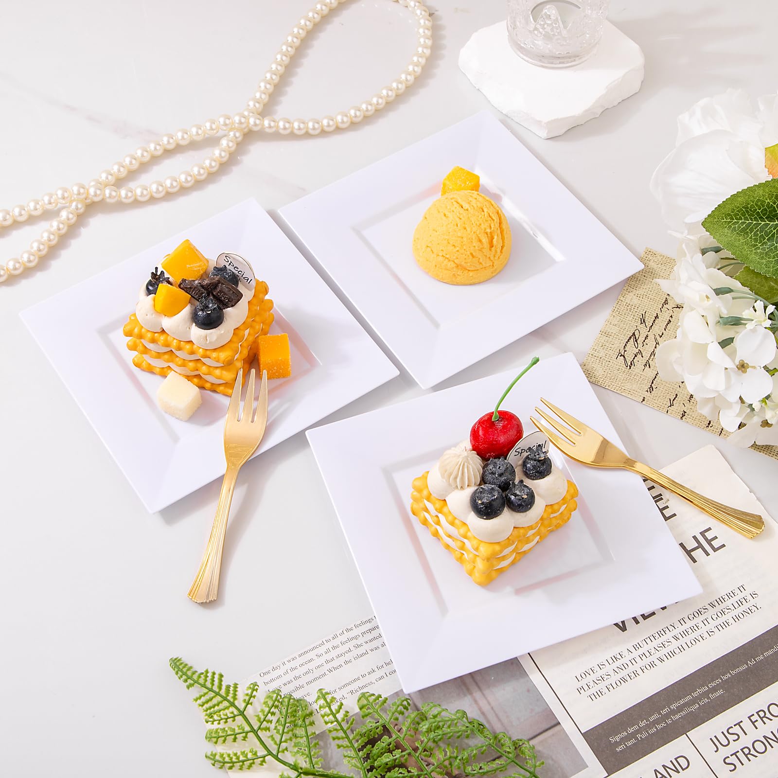 Supernal 200-piece guest-set packaging showing plates and forks.