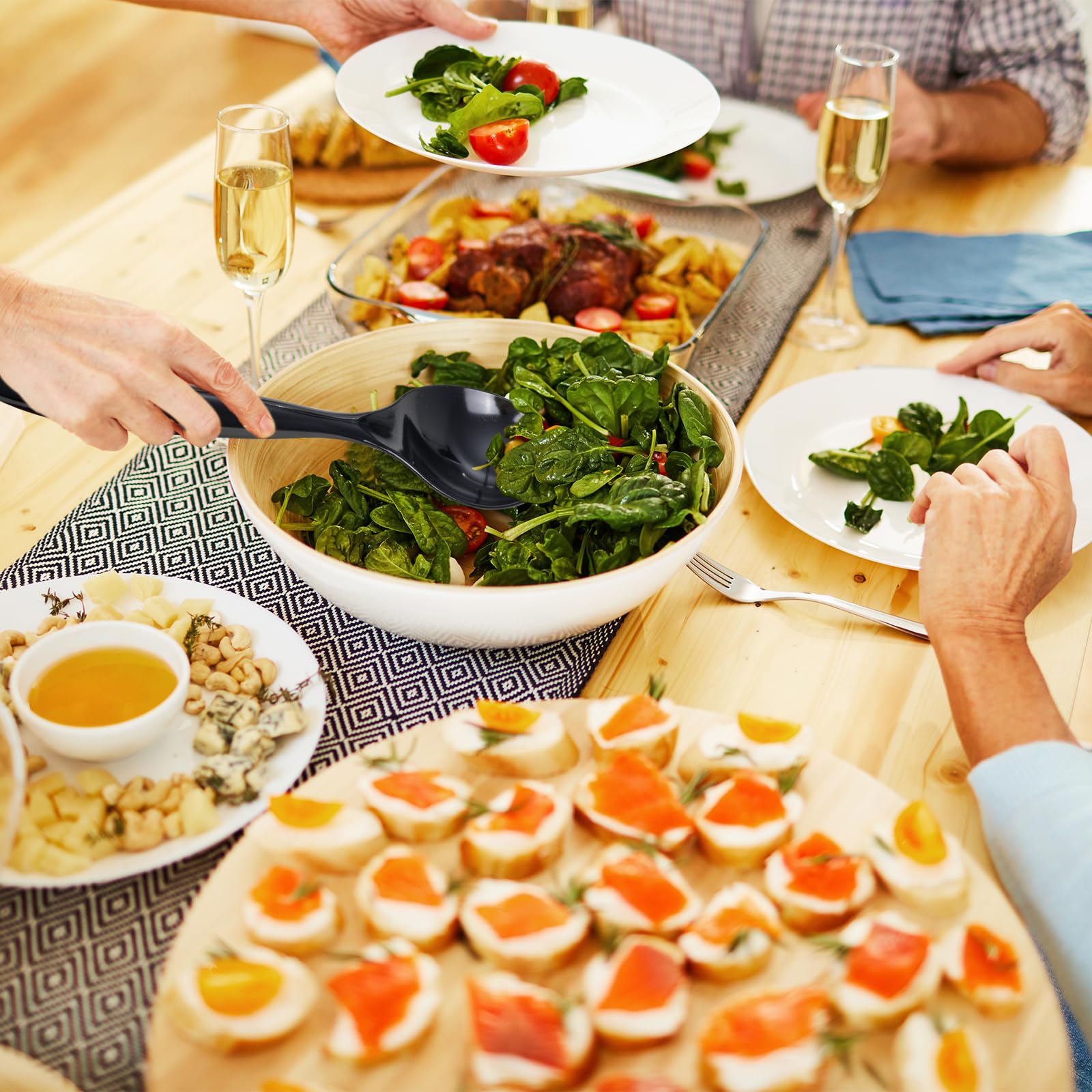 Supernal 9.75in serving spoons with ergonomic handles for comfortable use.