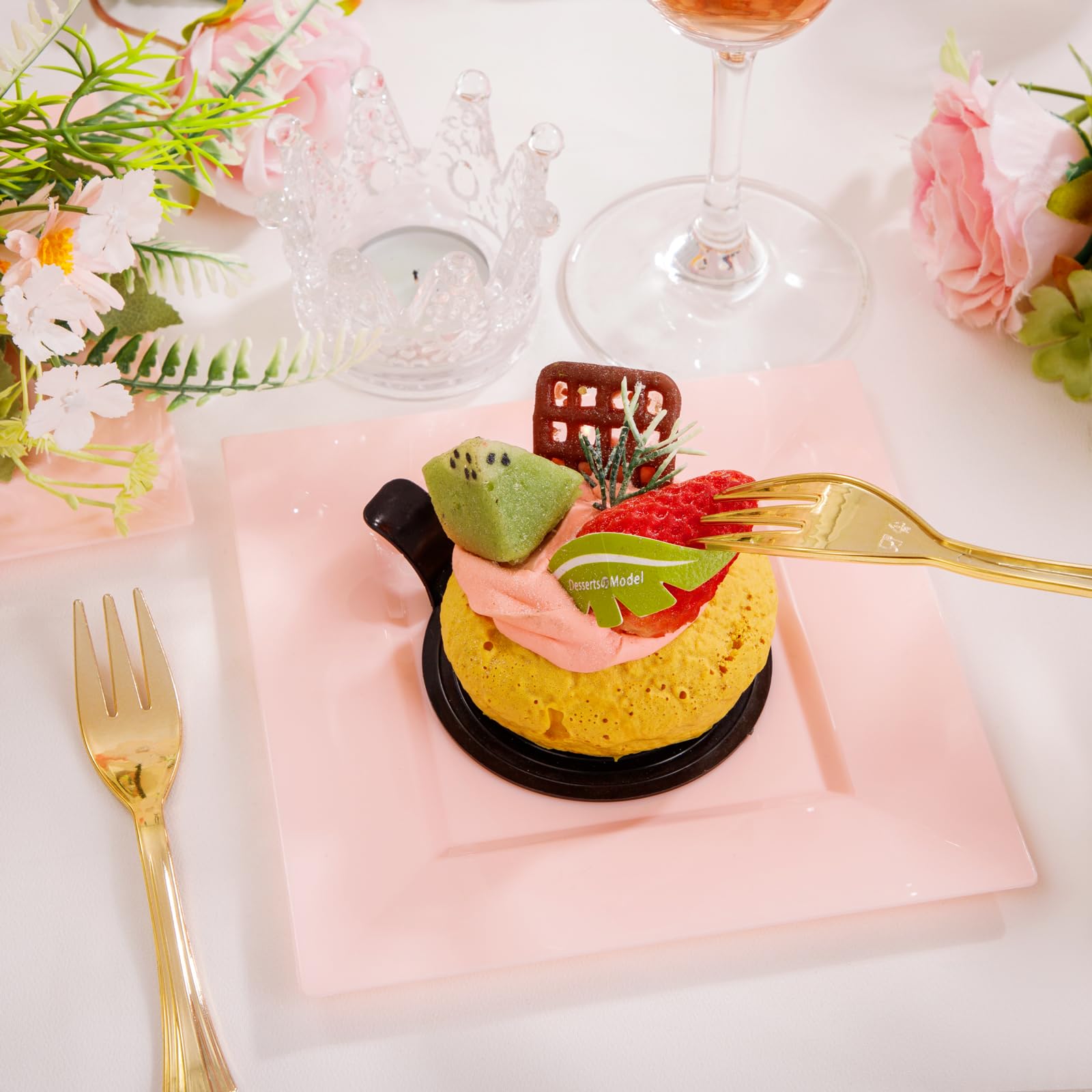 Supernal value-packed set includes dinner plates, forks, and dessert plates.