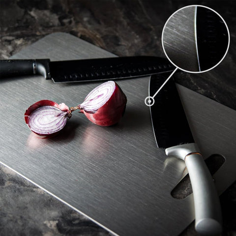 SUQ Upgrade Titanium cutting board in a tidy kitchen setup with knives