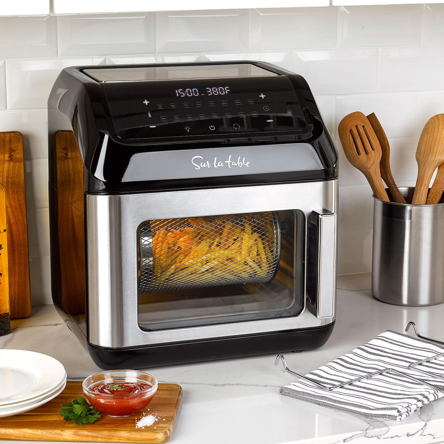 Sur La Table air fryer interior shows 13-quart capacity for larger batches.