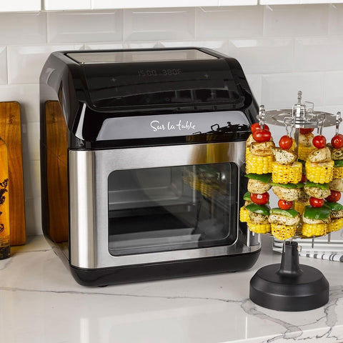 Sur La Table left hinge air fryer angled touchscreen for easy, quick presets.