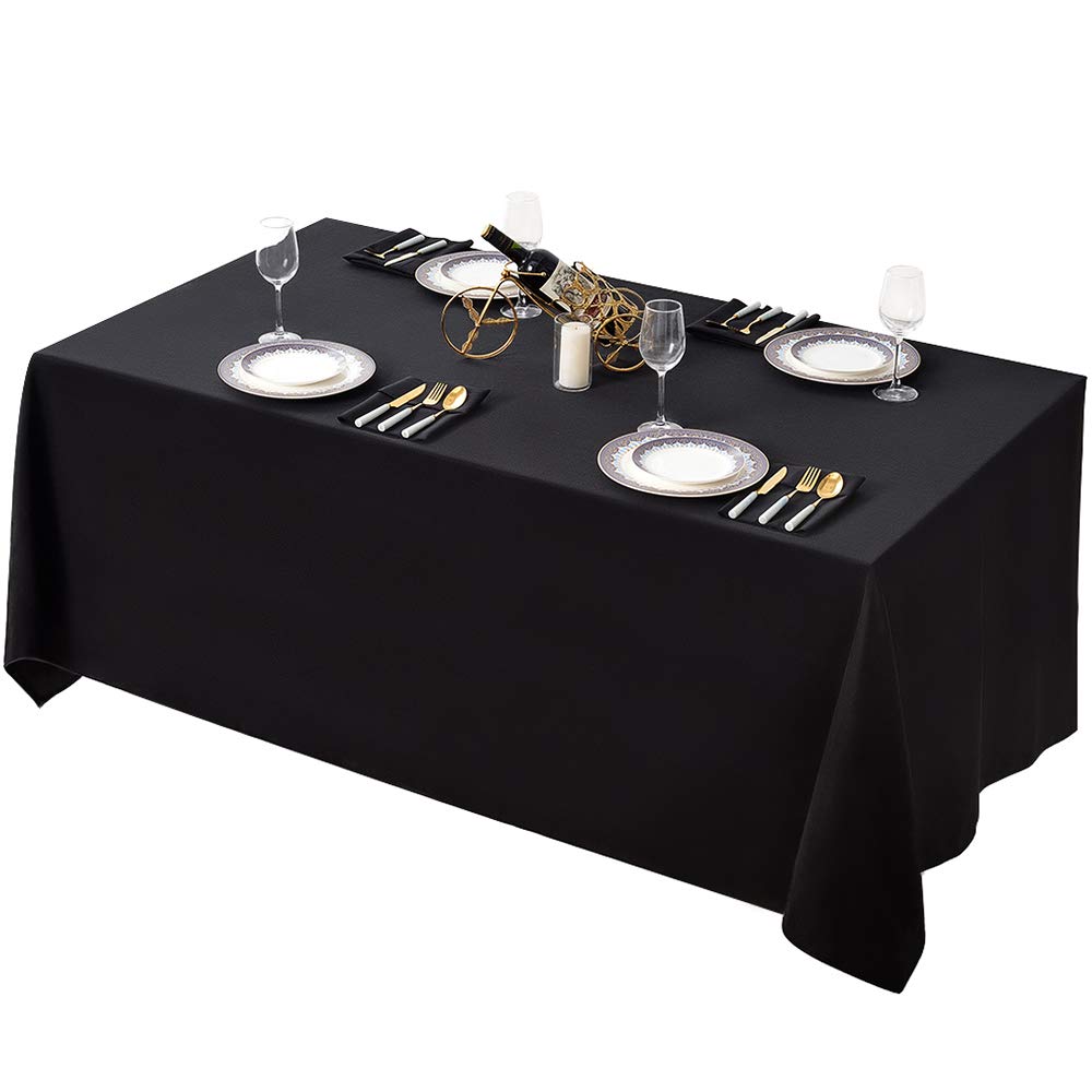 Surmente black tablecloth 90x132 on a rectangular table for elegant coverage.