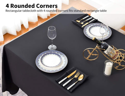 Surmente black tablecloth on outdoor dining setup for a sophisticated ambiance.