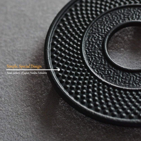 Suyika black cast-iron teapot trivet adds durability and classic style to any kitchen.