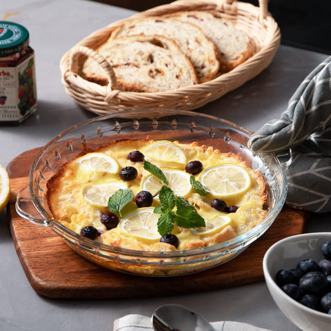 Sweejar glass pie pan with soft wave edge for improved grip and presentation.