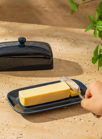 Sweese 7.8-inch butter container fits full sticks with space.