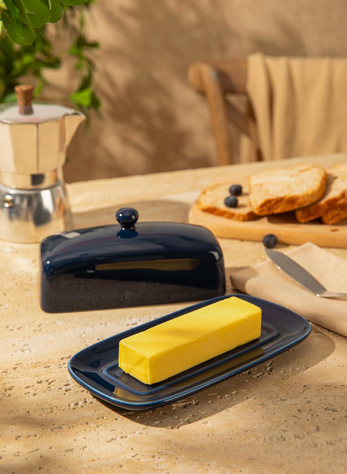 Sweese center-ridges butter keeper keeps butter centered and neat.