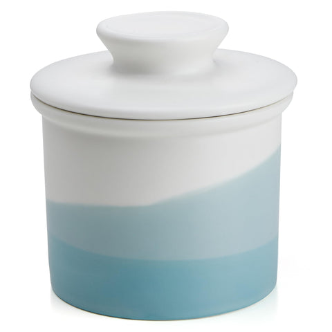 Sweese light-green French butter dish with lid showing calm matte glaze and elegant countertop presence.