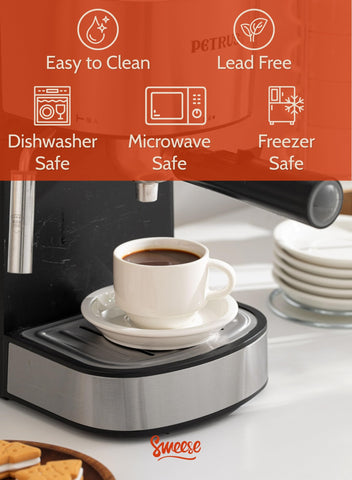 Sweese metal stand keeps four white cups organized in a compact kitchen.