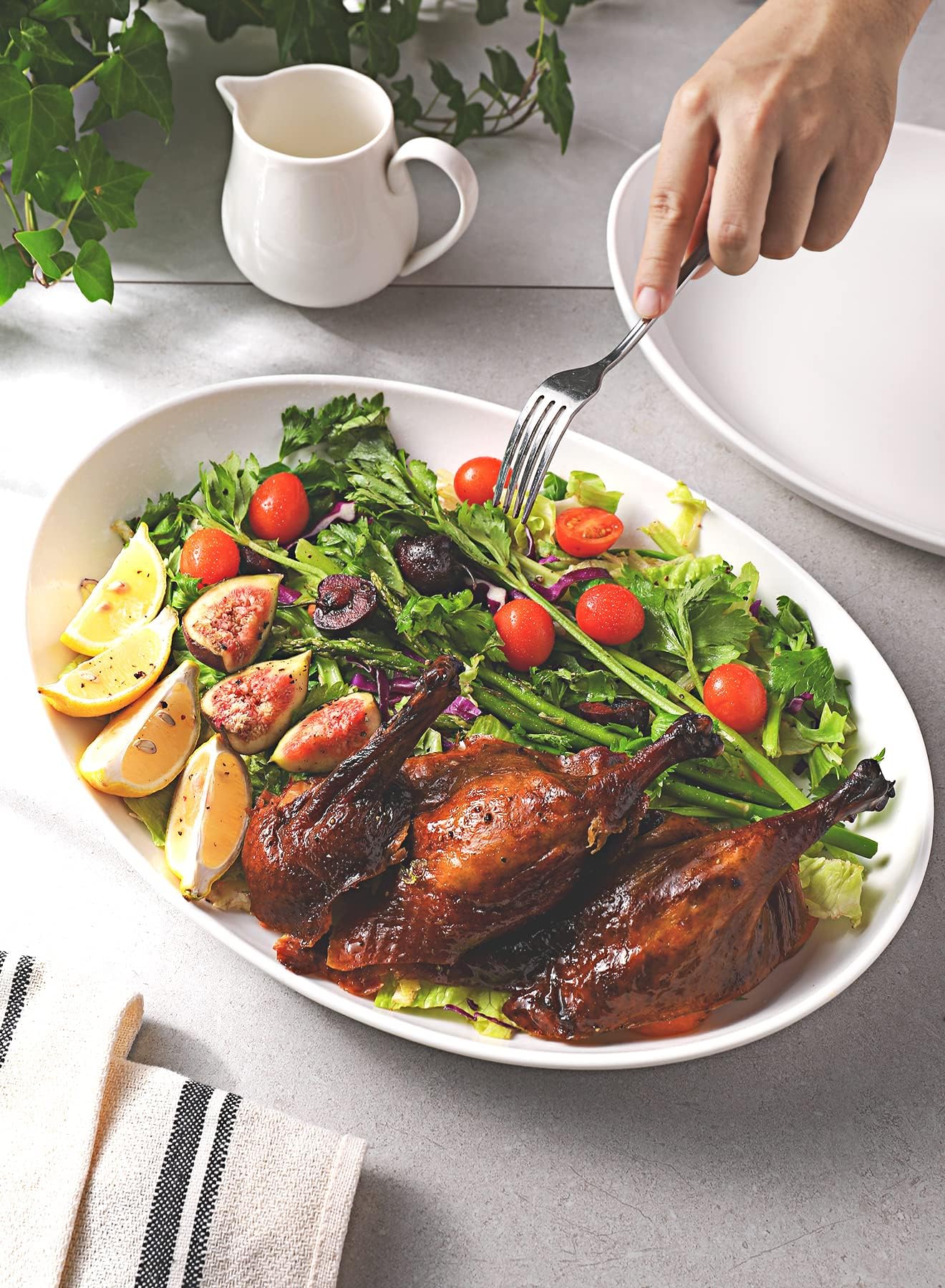 Sweese oval serving platter demonstrates versatile use from appetizers to mains