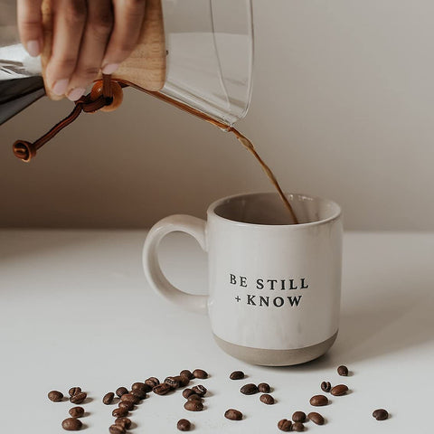 Sweet Water Decor Be Still and Know mug, side view showing dual-sided scripture artwork.