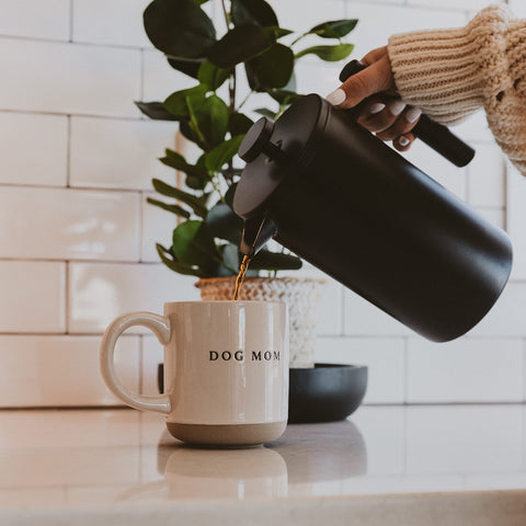 Sweet Water Decor Dog Mom mug on kitchen counter, perfect for coffee or tea