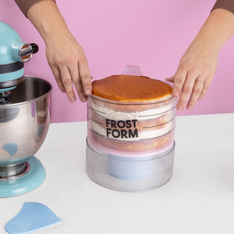 Sweetshop Stand supports stable icing setup for tall cake projects.