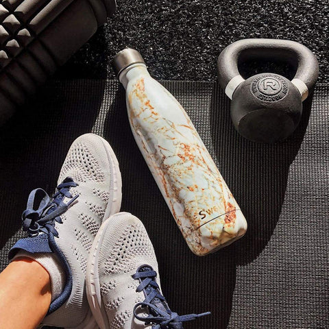 S'well Calacatta Gold 25oz bottle in bag, sweat-free exterior