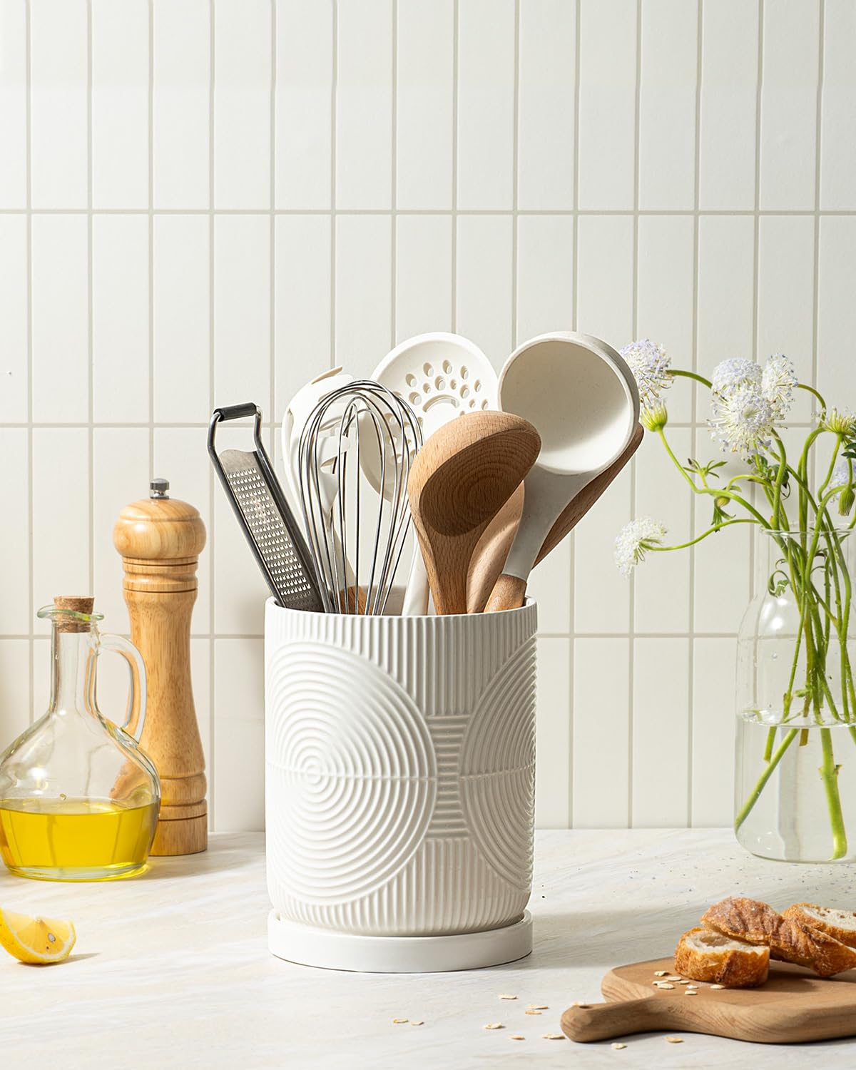 Swicken utensil holder shows concentric texture for subtle kitchen style.