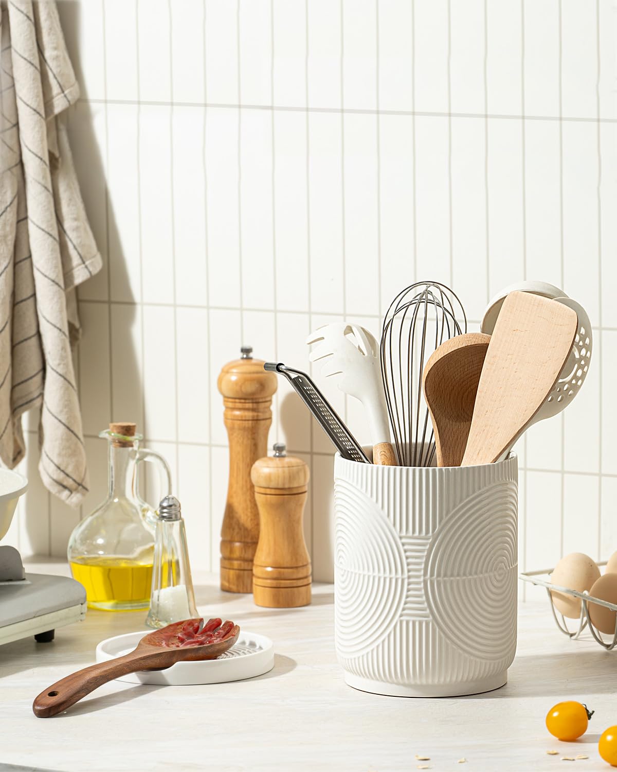 Swicken large-capacity holder fits spatulas, spoons, and whisks.