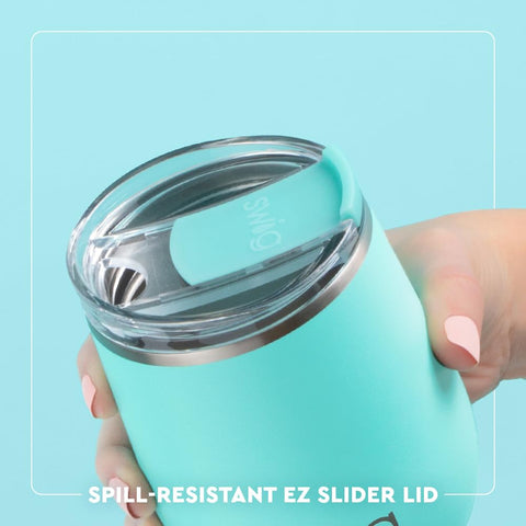 Swig Life coaster base under a tumbler for stability and no-slip placement.