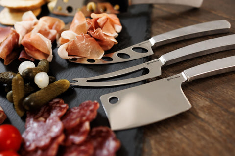 Swissmar Barcelona fork-tip serves cheese pieces without extra tools.