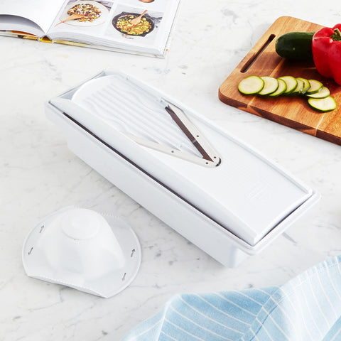 Swissmar V-Prep Mandoline Slicer with thick/thin insert enabling versatile thickness control