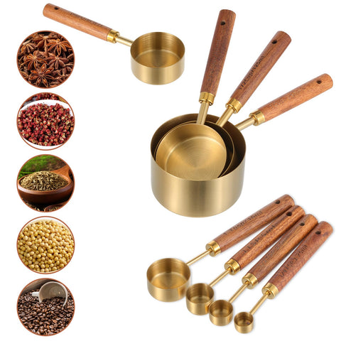 Elegant SynHHnergyx gold measuring cups and spoons arranged for stylish kitchen use.