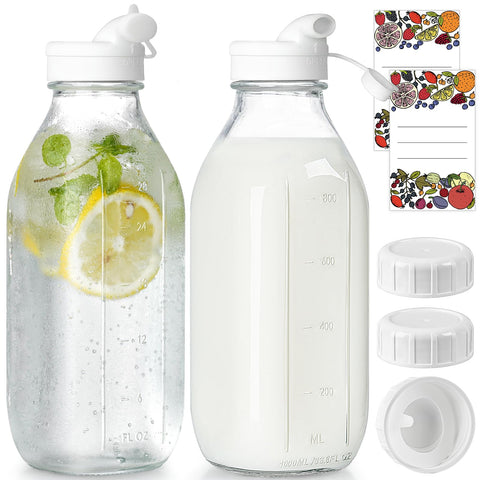 Syntic 2-pack glass milk bottles with dispenser caps for airtight storage.