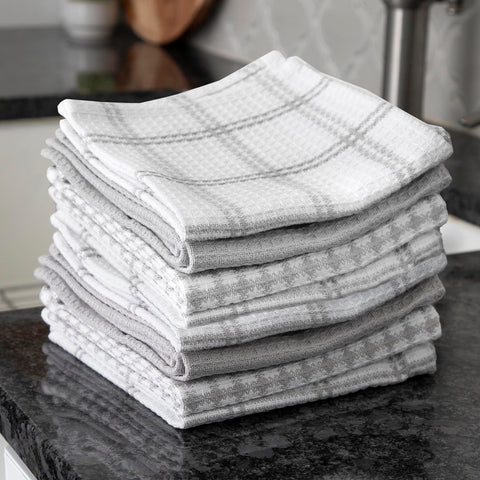 T-Fal waffle dish cloths demonstrate fast drying through waffle weave after washing dishes.