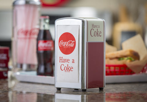 Bulk 100-pack napkins support busy venues with Coca-Cola flair.