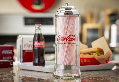 TableCraft Coca-Cola glass straw dispenser side view shows wrapped and unwrapped straw compatibility.