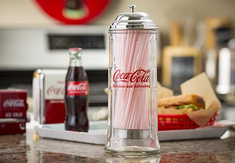 TableCraft Coca-Cola glass straw dispenser side view shows wrapped and unwrapped straw compatibility.