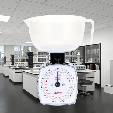 TADA scale tare function demonstrated for quick zeroing between ingredients.