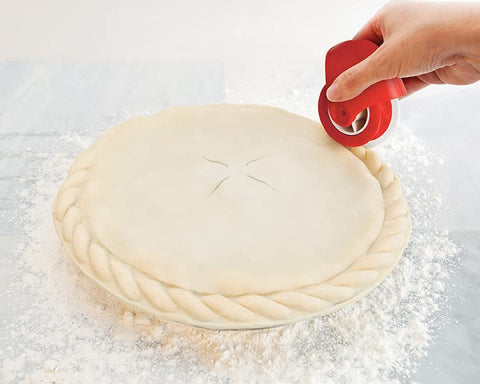 Talisman Designs Pastry Wheel Decorator rolls smoothly around dough for even textures.