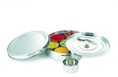 Tanish Trading stainless steel spice boxes on a kitchen shelf save space and durability.