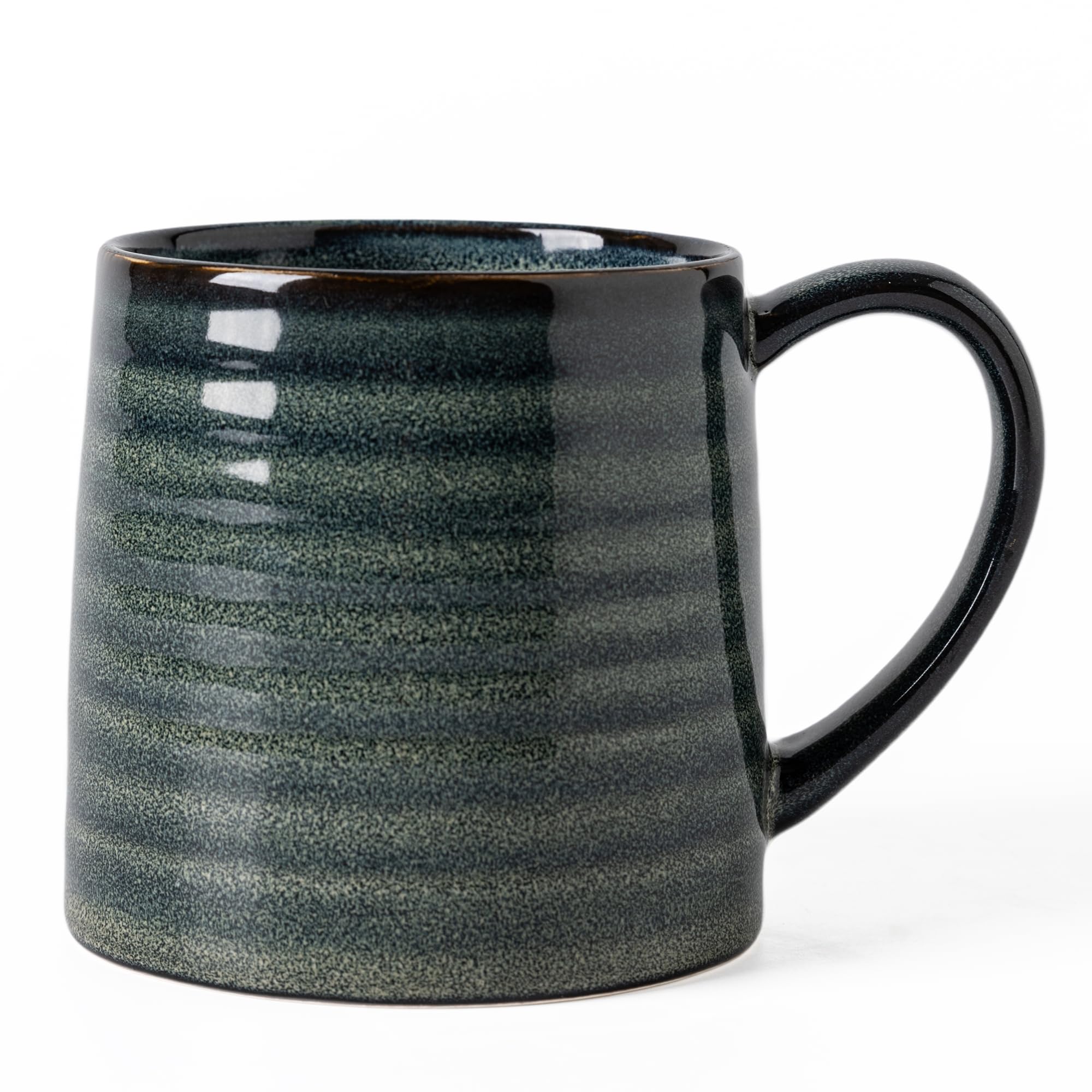 The TaoTaojarvie 21 oz mug with dark green transmutation glaze for bold coffee.