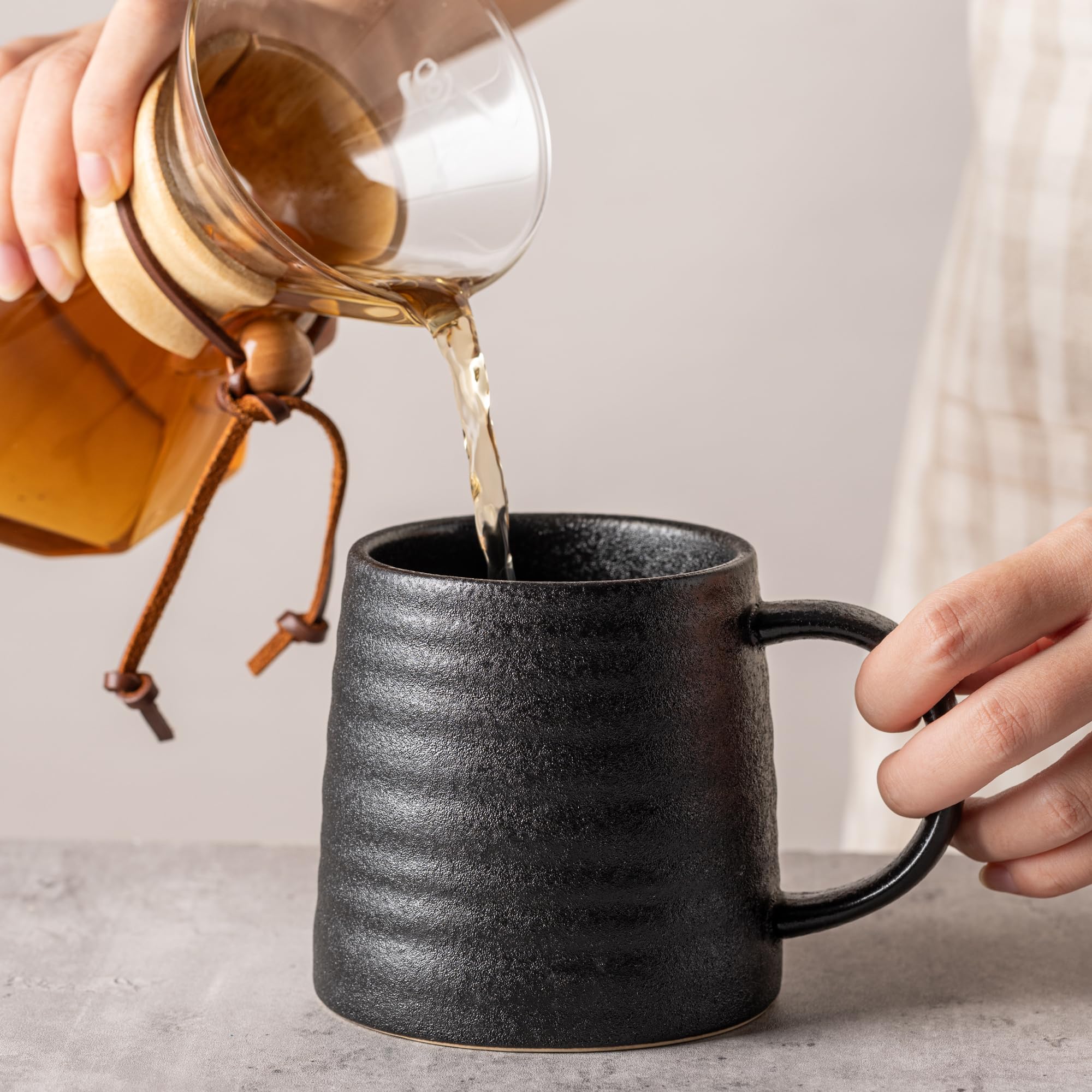 TaoTaojarvie mug handle closeup with comfortable grip.