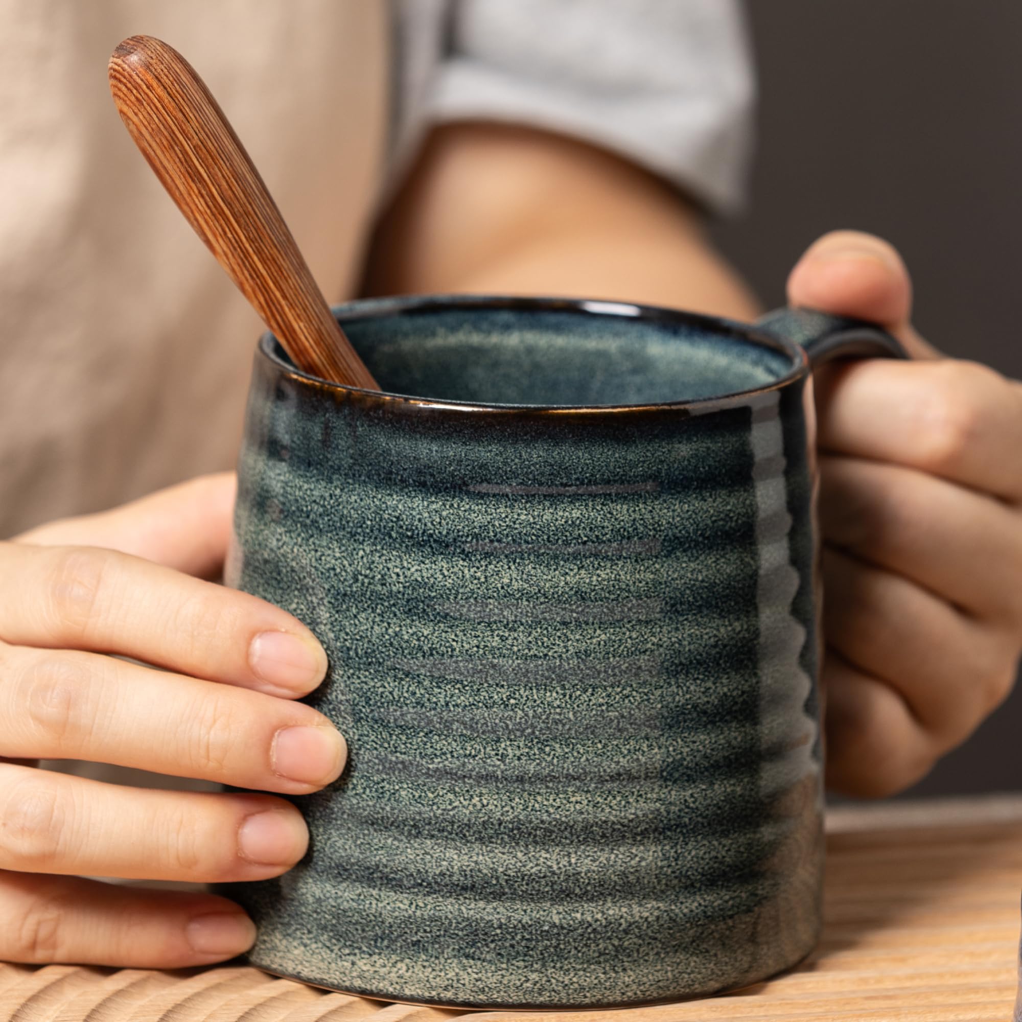 TaoTaojarvie ceramic mug with a large handle for easy grip.