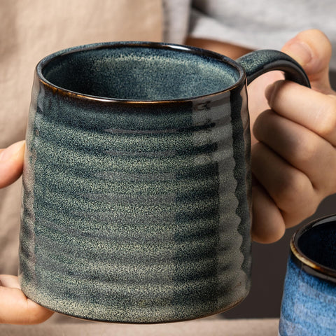 TaoTaojarvie mug showcases unique kiln glaze variations and artisanal charm.
