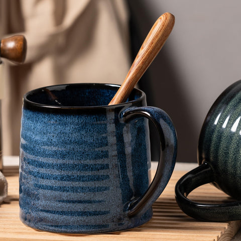 TaoTaojarvie transmutation-glaze mug features unique color variations and artistic appeal.
