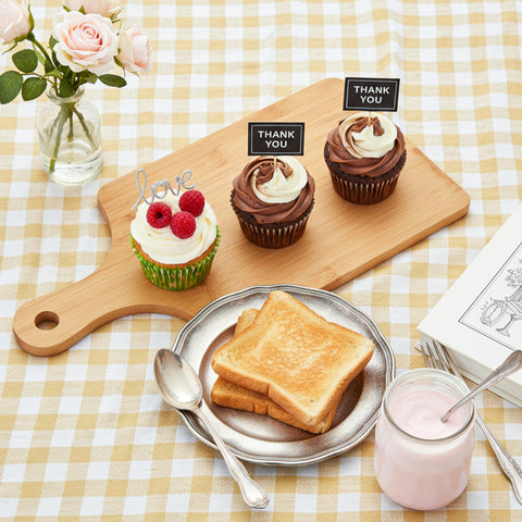 Tarunmo picnic serving board set up for an outdoor snack spread