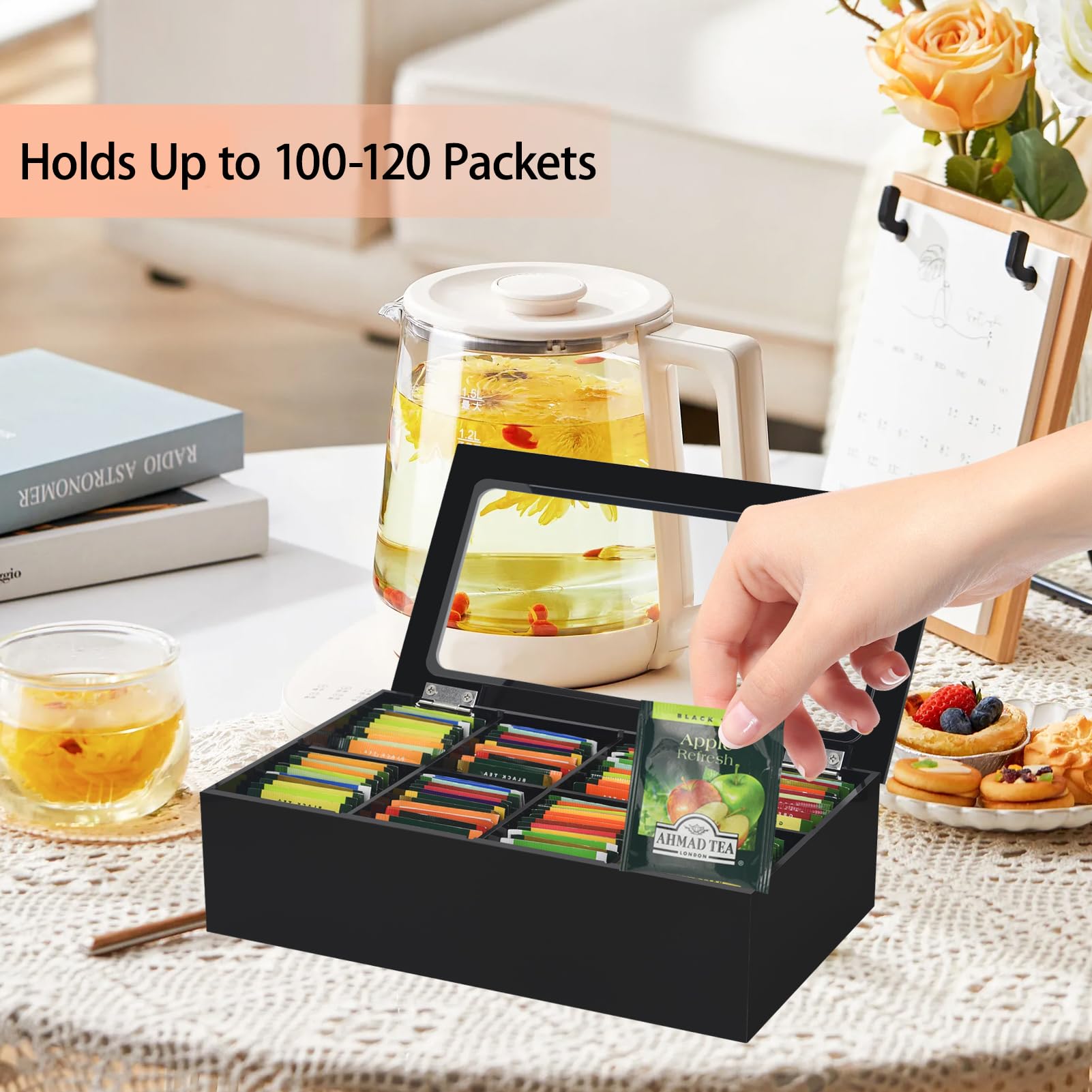 Tasybox acrylic tea box with lid shown on countertop for easy visibility.