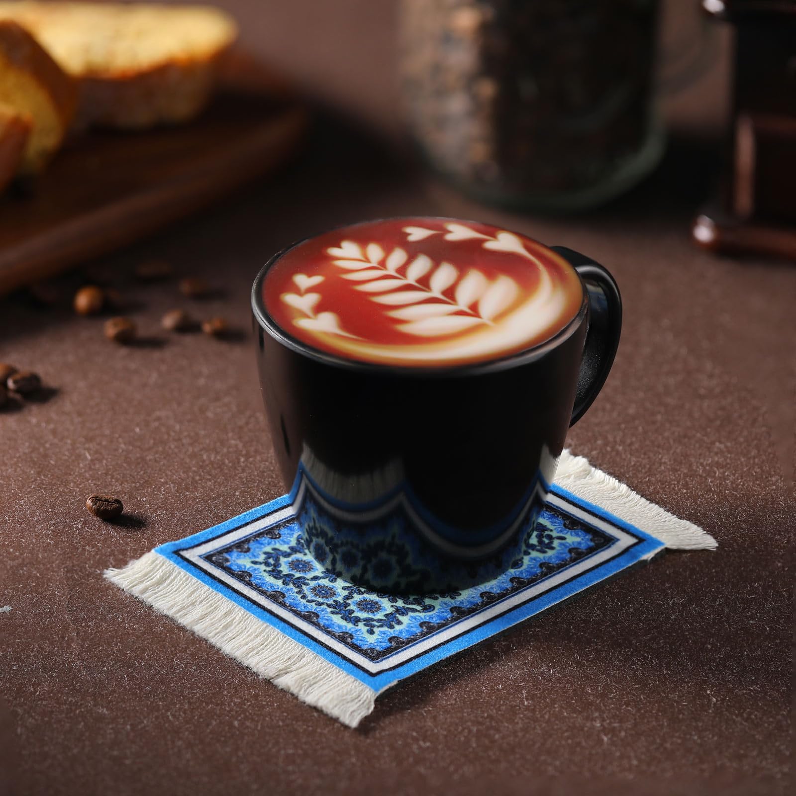 Tatuo coaster protects furniture from heat, moisture, and condensation.