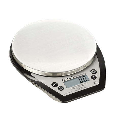 Taylor 1020NFS compact scale on a kitchen counter for precise portion control.