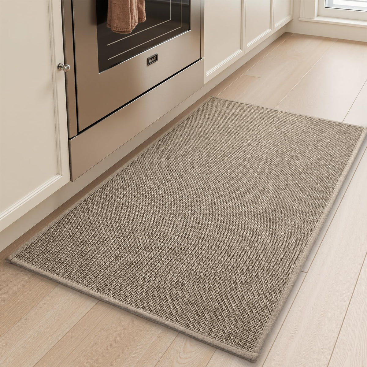 Tchdio front-of-sink tan kitchen mat showing non-slip, absorbent surface.