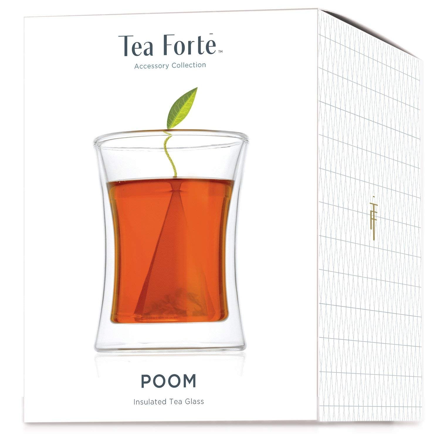 Tea Forte Poom hand-blown glass teacup showcases craftsmanship and infuser display.