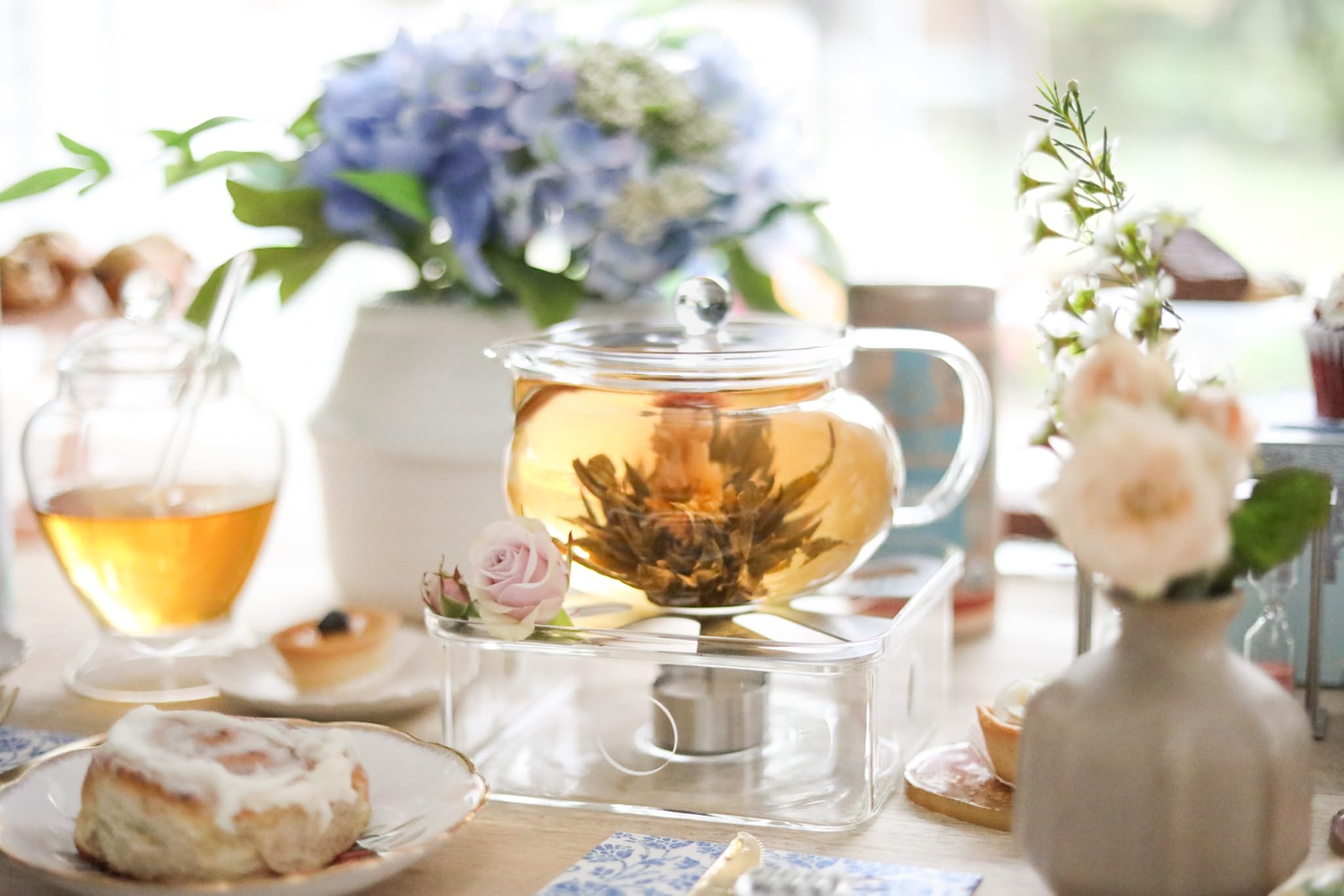 Kyoto glass teapot with removable infuser for blooming teas.