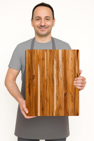 Teakhaus XL cutting board close-up teak grain emphasizes durability.