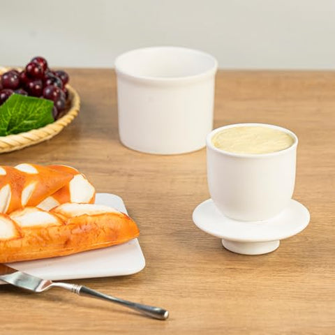 Teapeak porcelain dish butter keeper on the countertop for easy serving
