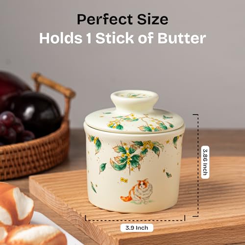 Teapeak porcelain butter keeper with bell-shaped lid preserves aroma and seal.