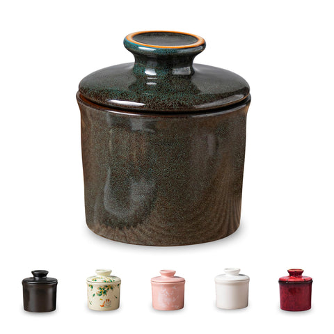 Teapeak porcelain butter keeper crock with water line on countertop showing freshness potential